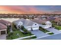 Luxury home with lake view in a gated community at 13072 Steinhatchee Loop, Venice, FL 34293
