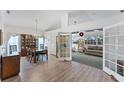 Elegant dining room with a wooden table, chairs, and built-in hutch at 1384 Clubview Ct, Venice, FL 34292