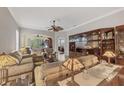 Spacious living room with built-in shelving and comfortable seating at 1647 Lancashire Dr # 1647, Venice, FL 34293
