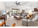 Spacious living room with comfortable seating, large TV, and access to the pool at 1675 Still River Dr, Venice, FL 34293