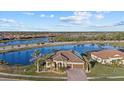 Property view showcasing lakefront location at 20450 Passagio Dr, Venice, FL 34293