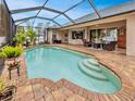 Relaxing screened pool area with ample patio space for entertaining at 4081 Roderigo Ave, North Port, FL 34286