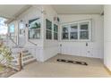 Steps leading to the entrance of a mobile home at 552 Fleetwood St, North Port, FL 34287