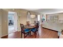Dining room with table, chairs, and view into living room at 649 Tamiami S Trl # 107, Venice, FL 34285