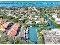 Aerial view of community, marina, and waterfront at 738 Sorrento Inlt # 738, Nokomis, FL 34275
