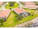 Property backs up to a lake in a community setting at 10319 Medjool Dr, Venice, FL 34293