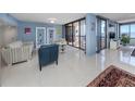 Spacious living room with water views and stylish furnishings at 2020 Harbourside Dr # 424, Longboat Key, FL 34228