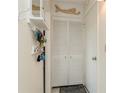 Bright entryway with built-in storage and coat rack at 244 Saint Augustine Ave # 107, Venice, FL 34285