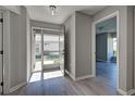 Light and bright entryway with wood-look floors at 3117 Heron Shores Dr, Venice, FL 34293