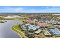 Resort-style amenities including pools, tennis courts, and clubhouse at 10058 Crooked Creek Dr # 201, Venice, FL 34293