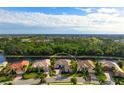 Luxury home with pool, situated on a tranquil waterway with lush landscaping at 1206 Tuscany Blvd, Venice, FL 34292