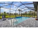 Screened pool and spa with ample patio space at 19807 Bridgetown Loop, Venice, FL 34293