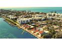 Aerial view of a waterfront home with private dock access at 2985 N Beach Rd # C8-1, Englewood, FL 34223