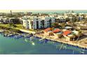 Aerial showing waterfront property with private boat docks at 2985 N Beach Rd # C8-1, Englewood, FL 34223