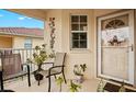 Relaxing front patio with seating and tropical plants at 4206 Vicenza Dr # C24, Venice, FL 34293