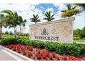 Watercrest community entrance sign with landscaping at 9824 Haze Dr, Venice, FL 34292