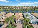 Aerial view of a beautiful home community near the water at 13864 Posada St, Venice, FL 34293