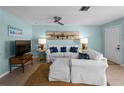 Living room features a comfy couch and calming decor at 1423 Avenida Del Circo # 1C, Venice, FL 34285