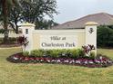 Community entrance sign for Villas at Charleston Park at 2890 Whispering Pine Ln, North Port, FL 34287