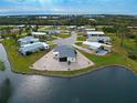 Community view showcasing waterfront property at 3300 Blue Jay Ln, Englewood, FL 34224