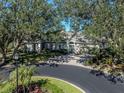 Luxury home nestled in a lush, tree-lined neighborhood at 441 Tremingham Way, Venice, FL 34293