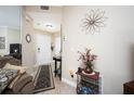 Inviting entryway with tile floors, decorative accents, and coat rack at 5800 Sabal Trace Dr # 701, North Port, FL 34287