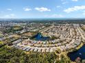 Aerial view of community near the water at 664 Linden Dr, Englewood, FL 34223