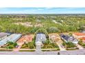Community overview featuring a row of houses, highlighting one in particular at 12386 Sagewood Dr, Venice, FL 34293