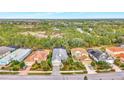 Community view showcasing several homes with varying architectural styles at 12386 Sagewood Dr, Venice, FL 34293