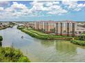 Waterfront community with lush landscaping and boats at 157 Tampa E Ave # 407, Venice, FL 34285