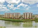 Luxury condos situated on the waterfront with boats at 157 Tampa E Ave # 407, Venice, FL 34285