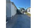 Storm damaged manufactured home with significant roof damage at 199 Palm Air Dr, Osprey, FL 34229