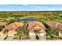 Community of villas with golf course and pond views at 4259 Whispering Oaks Dr, North Port, FL 34287