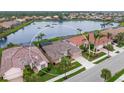 Aerial view showcasing a home's location in a quiet, residential neighborhood at 430 Marsh Creek Rd, Venice, FL 34292