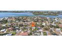 Aerial view showing the property's location in a residential neighborhood near the water at 441 N Shore Dr, Osprey, FL 34229