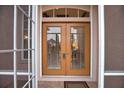 Double front doors with glass panels and blinds at 4940 Thames Ln, Sarasota, FL 34238