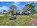 House exterior view, showing landscaping and driveway at 519 Rubens Dr # 519, Nokomis, FL 34275