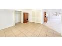 Dining area with tile floor and built-in shelving at 6246 Green View Cir # 97, Sarasota, FL 34231