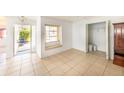 Bright dining room with tile floor and window seat at 6246 Green View Cir # 97, Sarasota, FL 34231