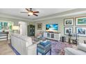 Elegant living room with ample seating and artwork at 702 Granada Ave # 7, Venice, FL 34285