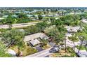 Aerial view of home and surrounding golf course community at 335 Pembroke S Ln # 229, Venice, FL 34293