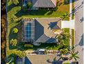 House with pool and backyard, seen from above at 4264 Wordsworth Way, Venice, FL 34293