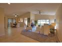 Spacious living room with ample natural light and comfortable seating at 4619 Forest Wood Trl # 7, Sarasota, FL 34241