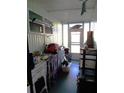 Utility/storage Florida room with various items at 476 Boxwood Dr, Venice, FL 34285
