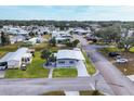 Mobile home community view with a home and street visible at 6401 Floral Ct, North Port, FL 34287