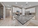 Open concept kitchen with a large island and plenty of cabinet space at 12029 Tapestry Ln, Venice, FL 34293