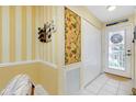 Bright entryway with painted walls and storage at 1602 Gondola Park Dr # 1602, Venice, FL 34292