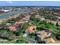 Bird's-eye view of a house in a community near a waterway at 249 Rio Terra, Venice, FL 34285