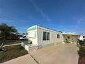 Front view of a single-wide manufactured home at 269 Outer Dr, Venice, FL 34285