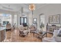 Spacious living room with ample natural light and elegant furnishings at 3162 Cordova Ter, North Port, FL 34291